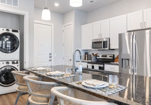 Kitchen with laundry area at 44 South in Austin, Texas