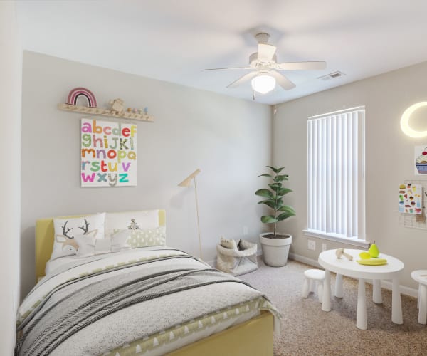A bedroom with children's furniture in a home at The Village at Midway Manor in Virgina Beach, Virginia