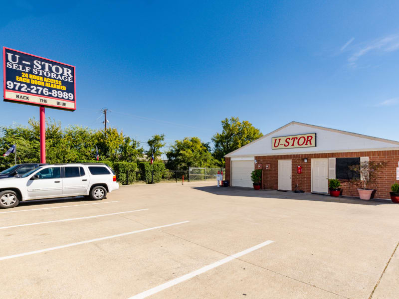 A view of the leasing office and sign at U-Stor Forest Lane in Garland, Texas