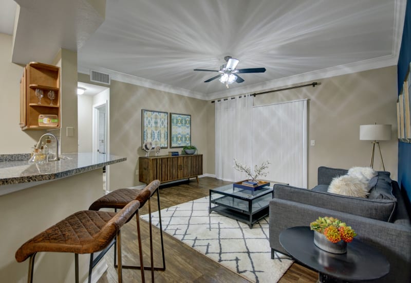 Spacious, open living room at Vista 121 Apartment Homes in Lewisville, Texas
