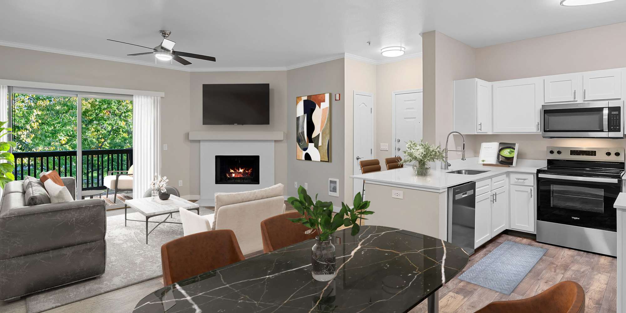 Kitchen and living room in Cortland Village Apartment Homes in Hillsboro, Oregon