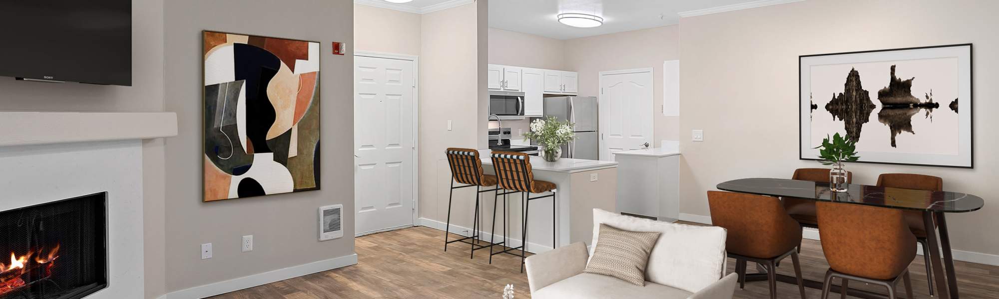 Renovated living room and kitchen at Cortland Village Apartment Homes in Hillsboro, Oregon