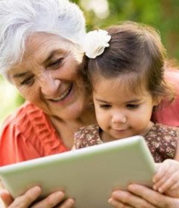 Woman reading to child at The Retreat at Carolina Bay in Hartsville, South Carolina
