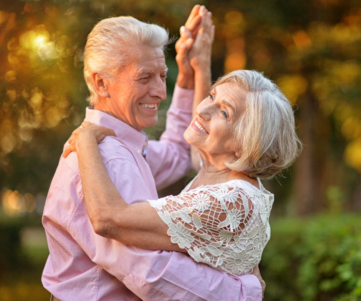 Senior couple dancing and smiling at Tuscany at McCormick Ranch in Scottsdale, Arizona