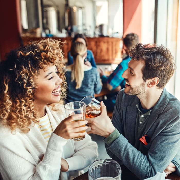 Residents enjoying a beer at a local craft brewery near The Greens at Westgate Apartment Homes in York, Pennsylvania