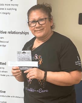 Juana Albino, CNA at Holton Manor and 2025 Shining Star Direct Caregiver Award recipient, smiling in a portrait.