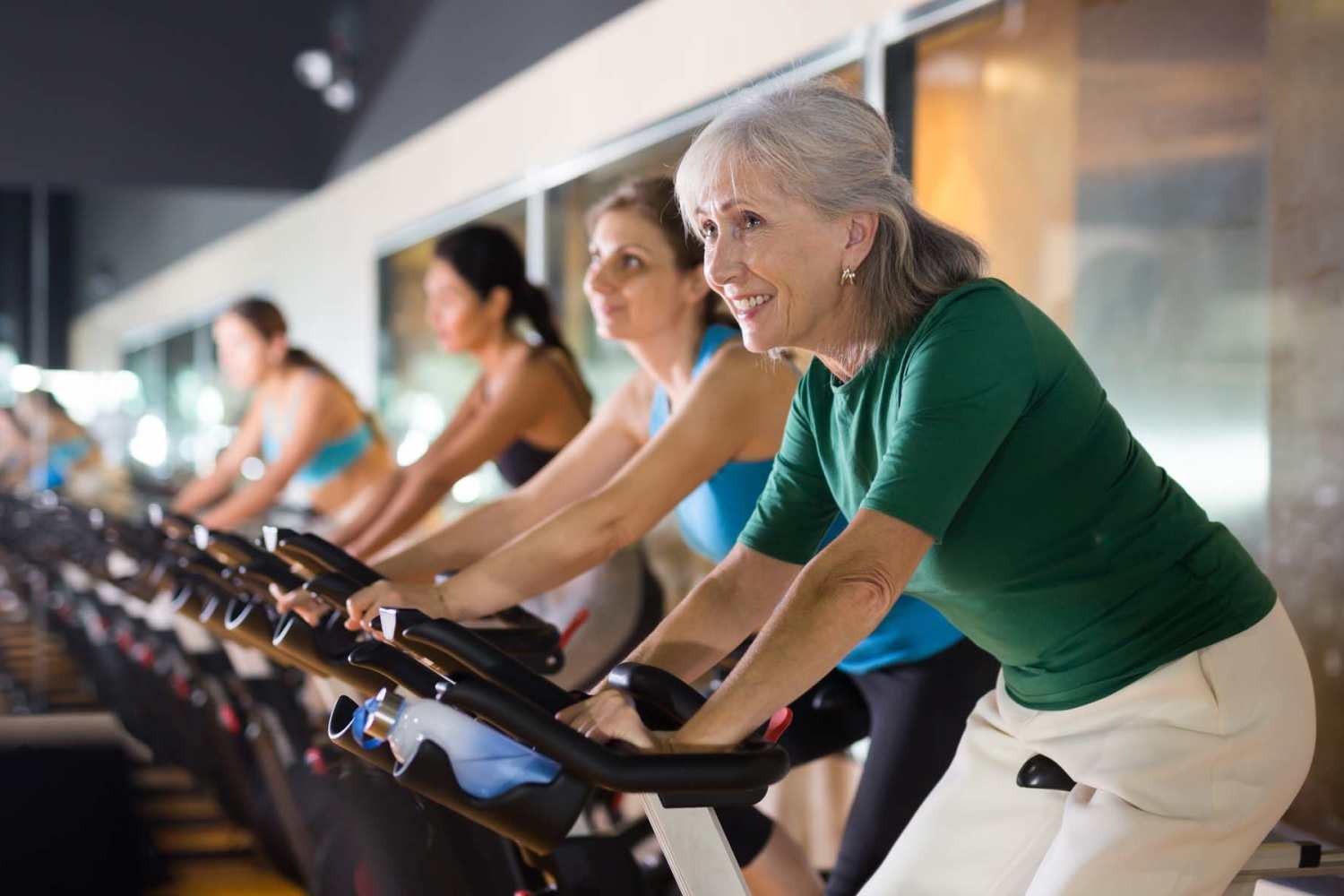Residents working out in the fitness center at La Cantera Senior Apartments in Albuquerque, New Mexico