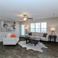 Wood flooring in a furnished apartment living room at Ten68 West in Dallas, Georgia