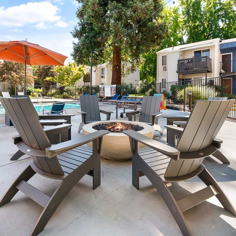 Outdoor sitting area around a firepit at Vista in San Jose, California