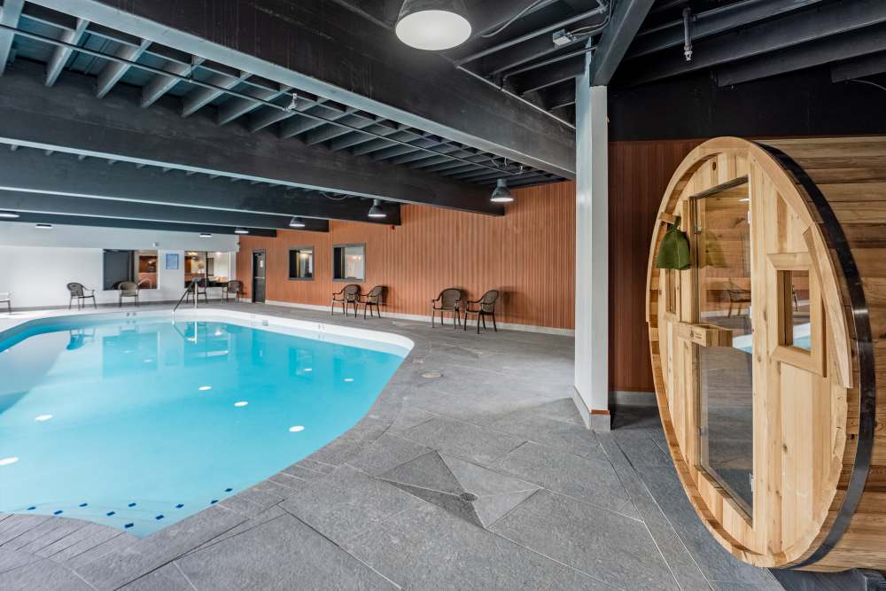 Indoor pool and sauna at Thea Apartments in Tacoma, Washington