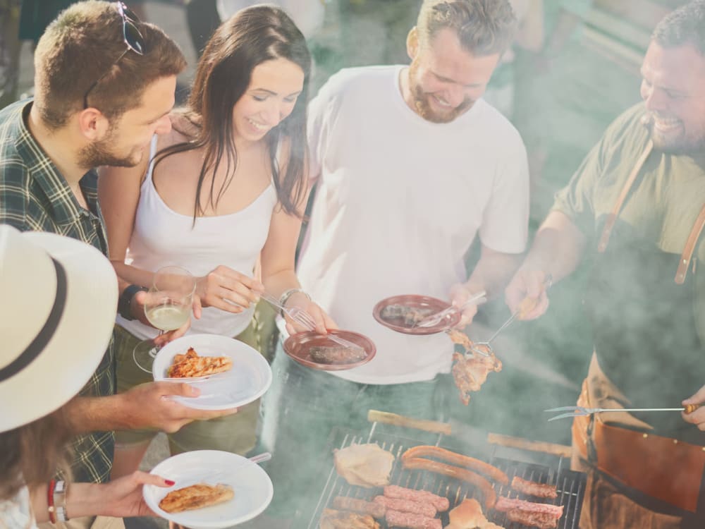 Residents at a BBQ near Ironwood Homes at River Run in Avondale, Arizona