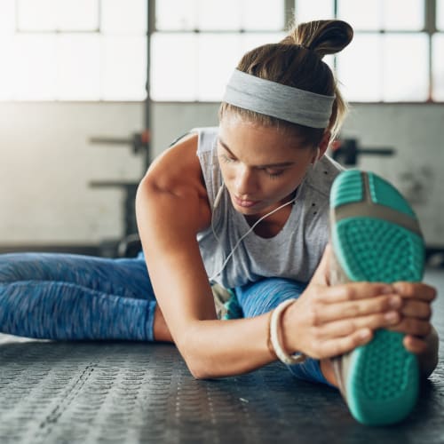 A resident working out in a gym near Perry Circle Apartments in Annapolis, Maryland