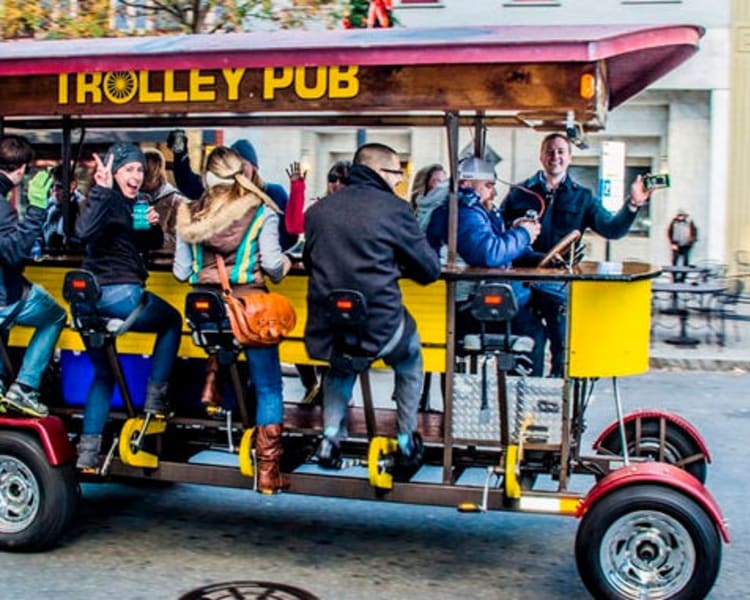 Folks out on a trolley pub crawl near Mercury NoDa in Charlotte, North Carolina