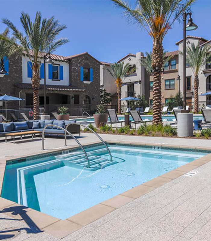 Resort-style pool at The Courtyards Pacific Village in San Diego, California