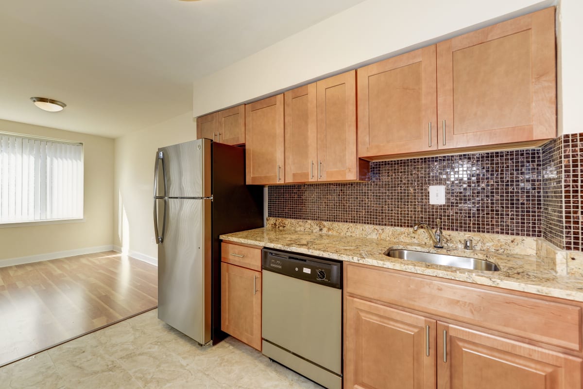 Very modern kitchen with stainless steel appliances at Michigan Park Commons in Washington, District of Columbia