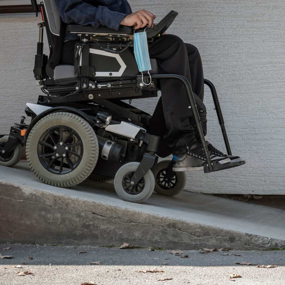 Resident in a wheelchair at Harmon Senior Villas in Fort Worth, Texas