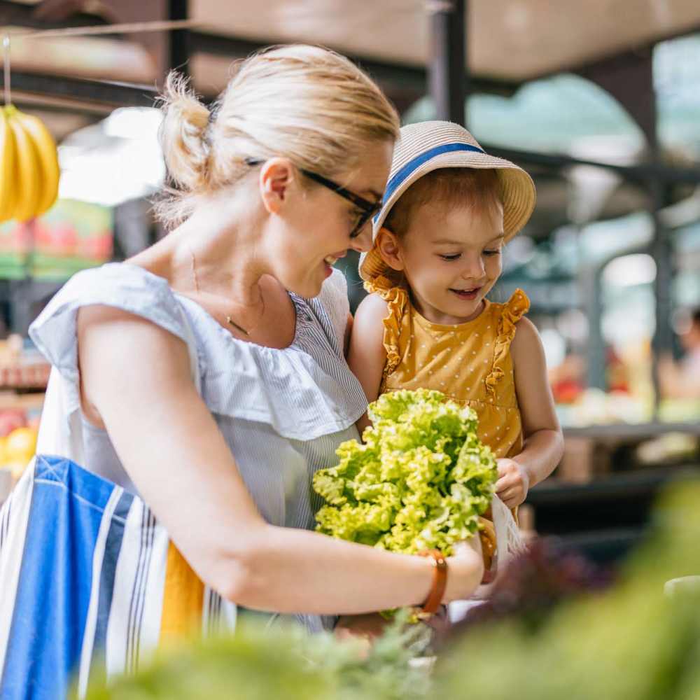 Resident with his daughter in market  at Yale Street Commons in Bridgeport, Connecticut