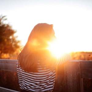 Resident enjoying the evening view at Windsor Gardens Apartments in Rochester, New York 