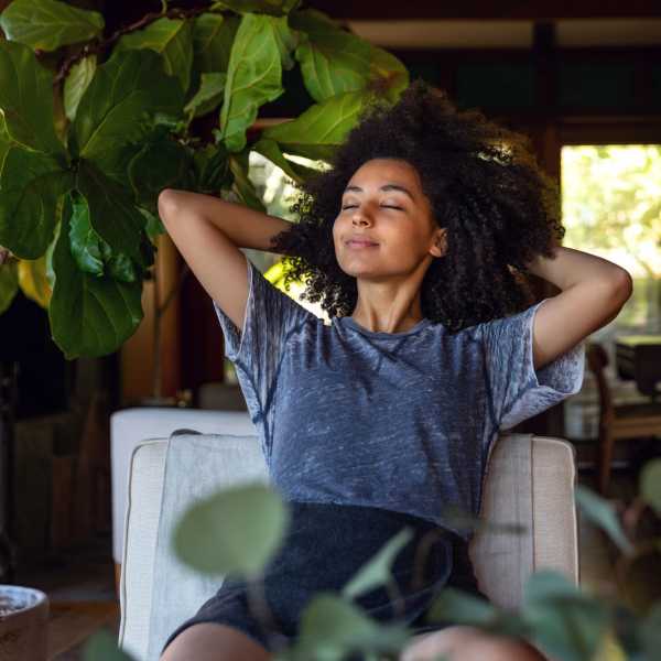 A resident relaxes in her apartment at Commons on Potomac Square, Sterling, Virginia