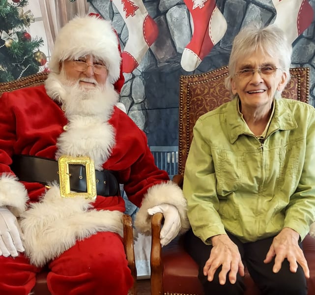 A River Park (TX) resident enjoys her time with Santa