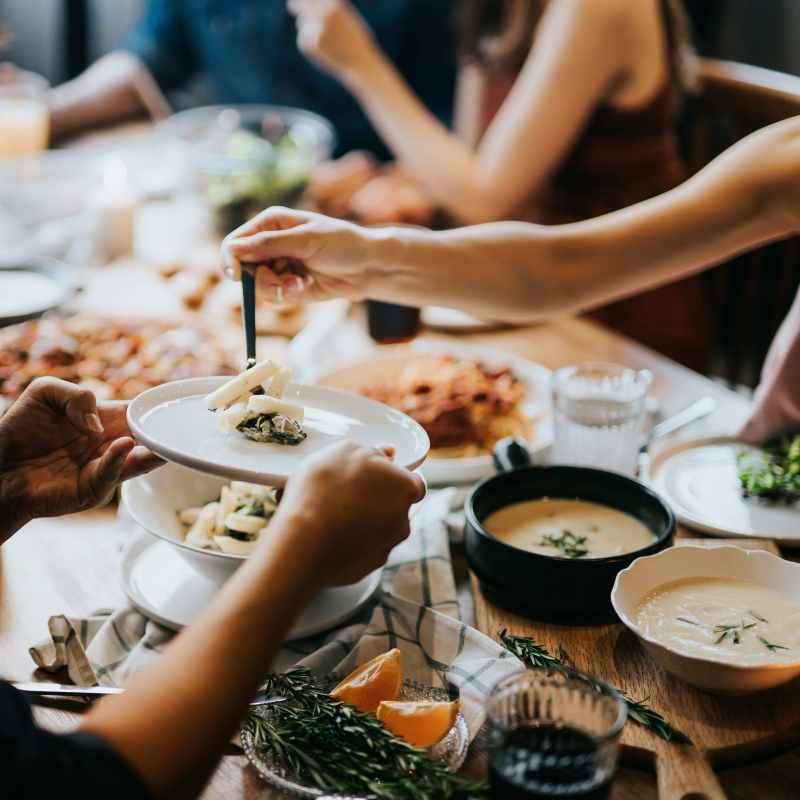 Friends enjoy a meal near Cedar Broad, Richmond, Virginia