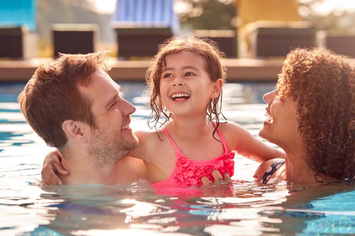 Family in the pool at Butterfield Commons in Maricopa, Arizona