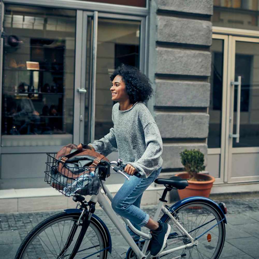 Woman cycling near South Pointe in Dallas, Texas