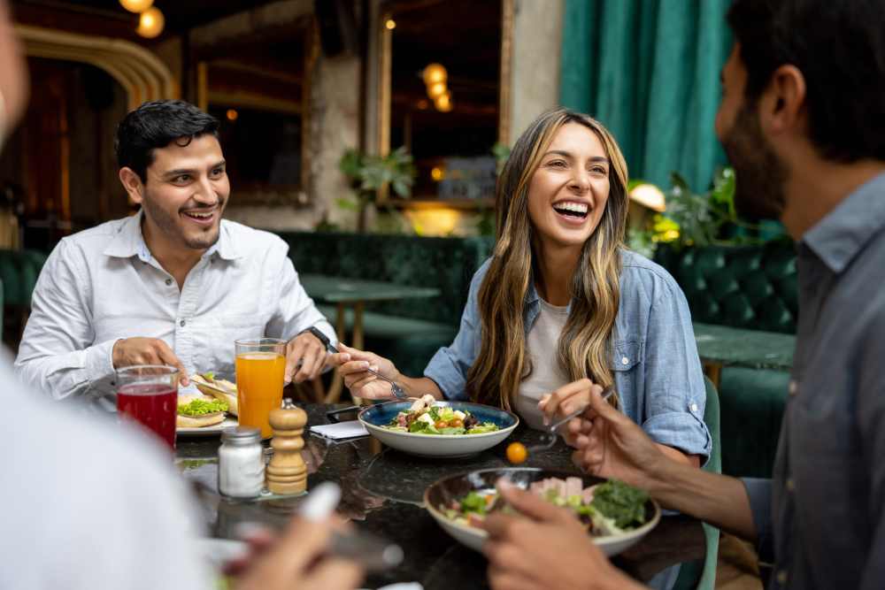 Residents friends having lunch at restaurant near E. Henry Twiggs Estates Phase I in Springfield, Massachusetts