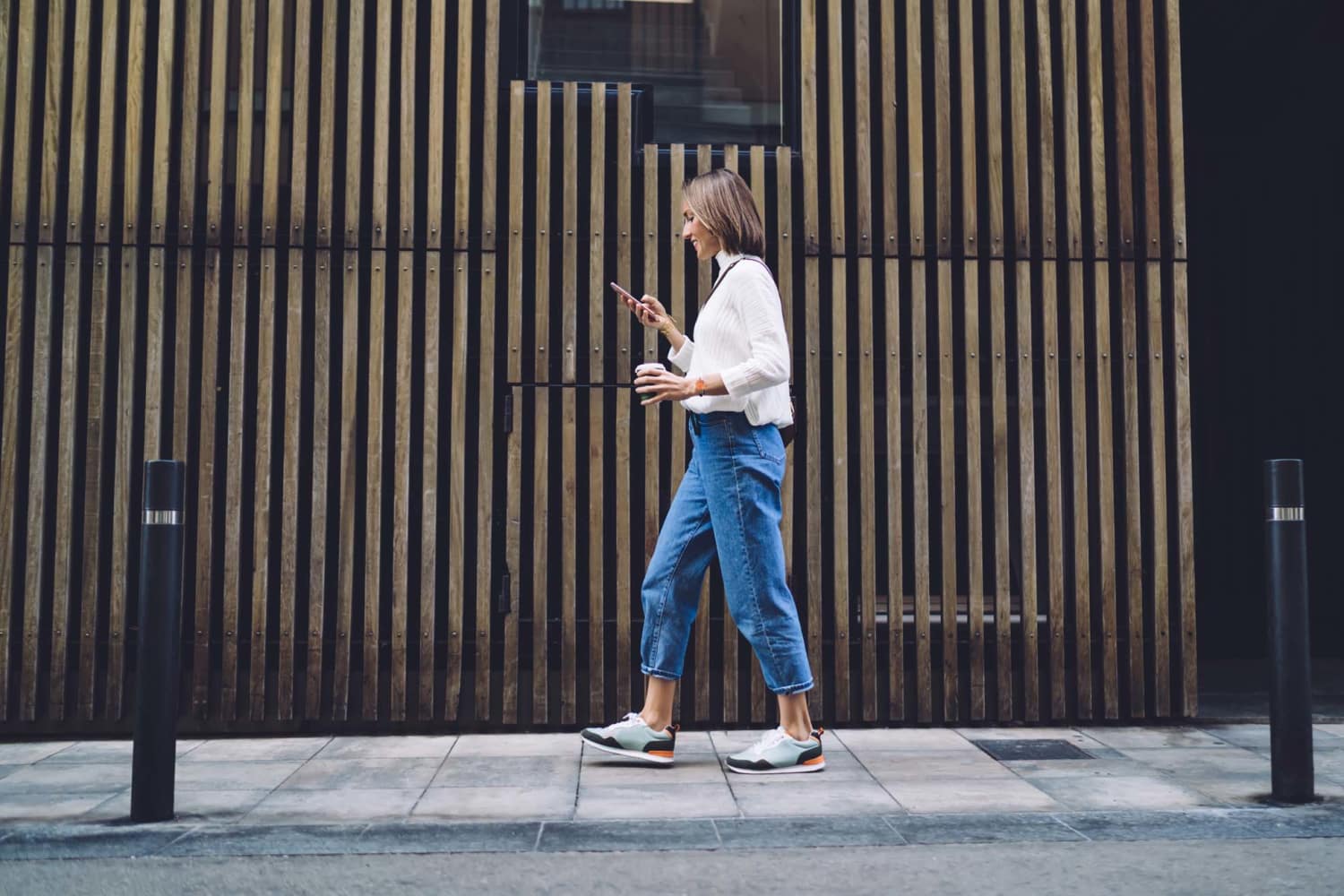 Woman walking in the downtown near Tucasa Townhomes in Irving, Texas