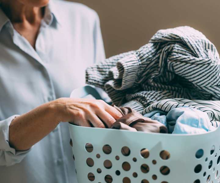 Residents with a basket of clothes at Parkwood Manor in Norfolk, Virginia