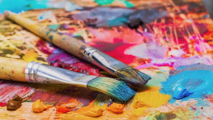 Used brushes on an artist
