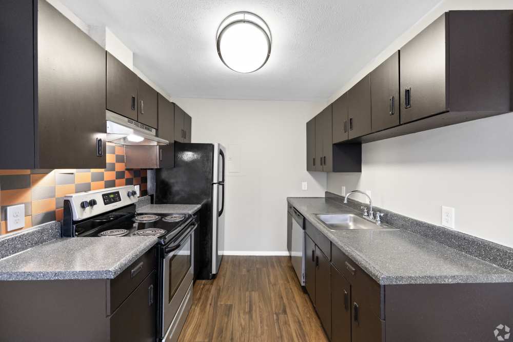 kitchen with dark brown cabinets