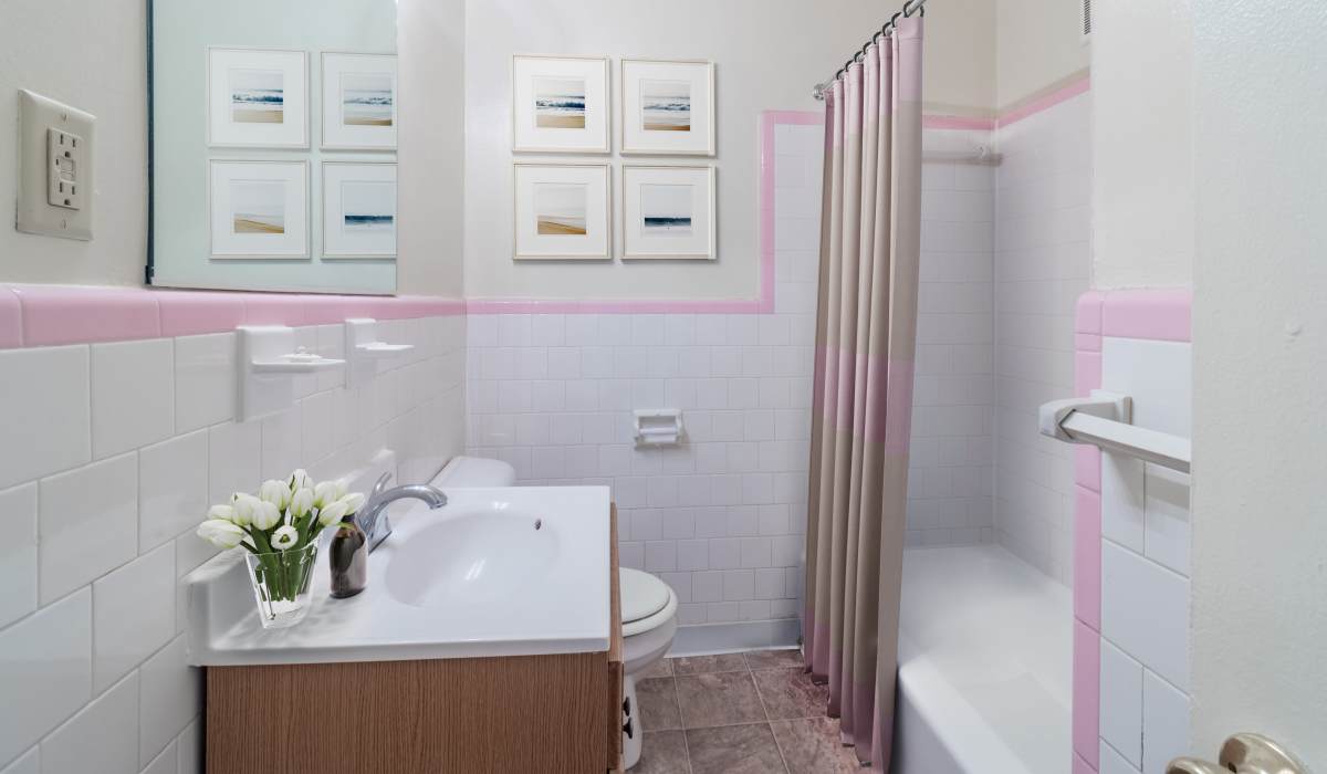 Bathroom with pink tile at Landmark at Patterson in Richmond, Virginia