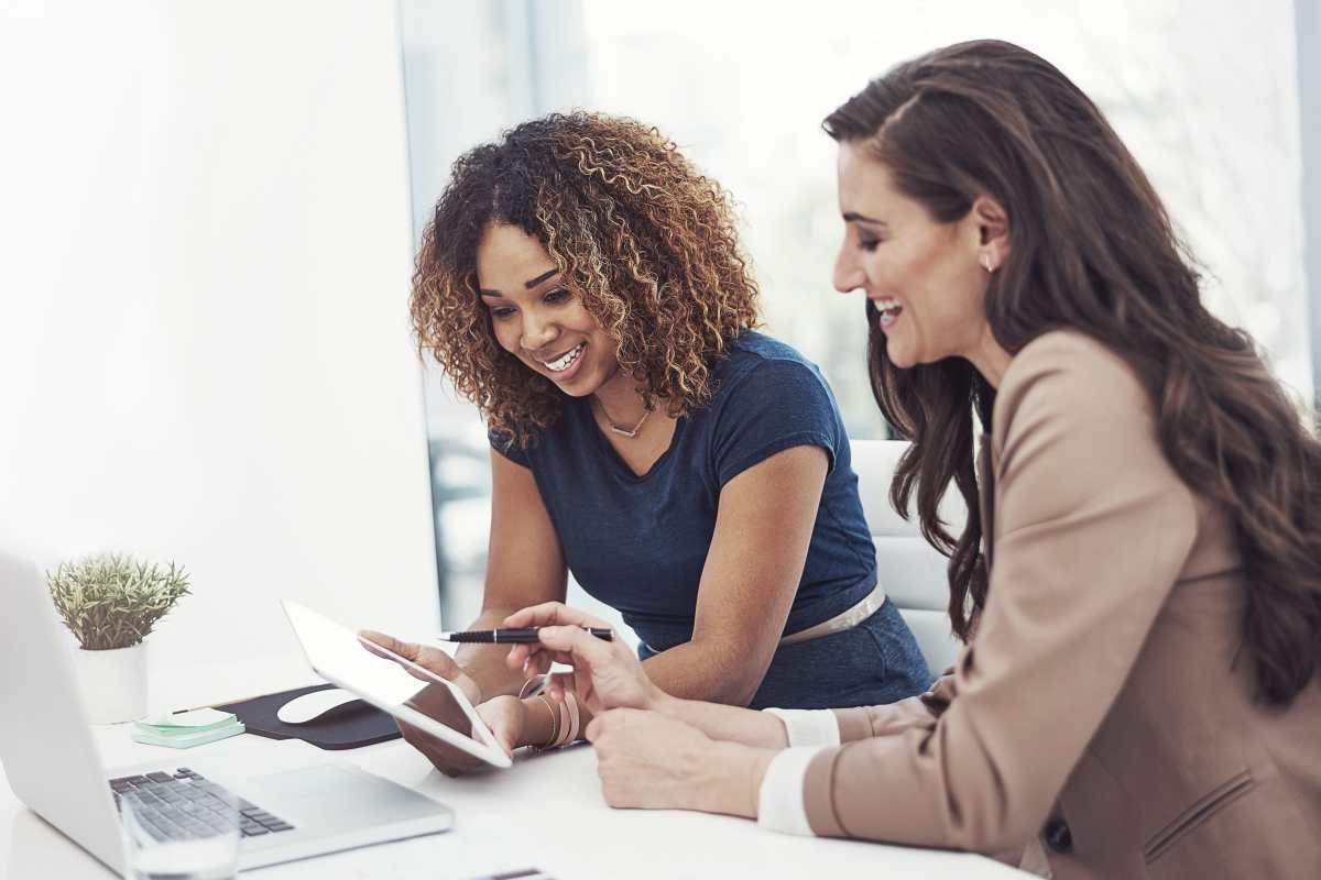 Women working on online rental payments at Tallow Wood in Bossier City, Louisiana