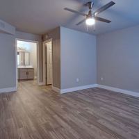Bedroom with wood flooring at Paseo Park in Glendale, Arizona