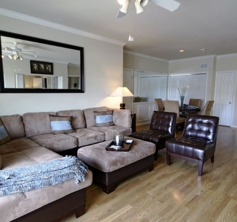 Well-decorated living area in a model home at Vail Quarters in Dallas, Texas