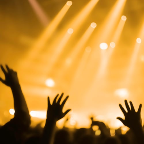 Hands up at a concert at The Vivian in Chicago, Illinois