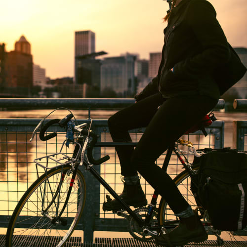 Resident taking a break from her bike ride near Brooklyn Yard in Portland, Oregon