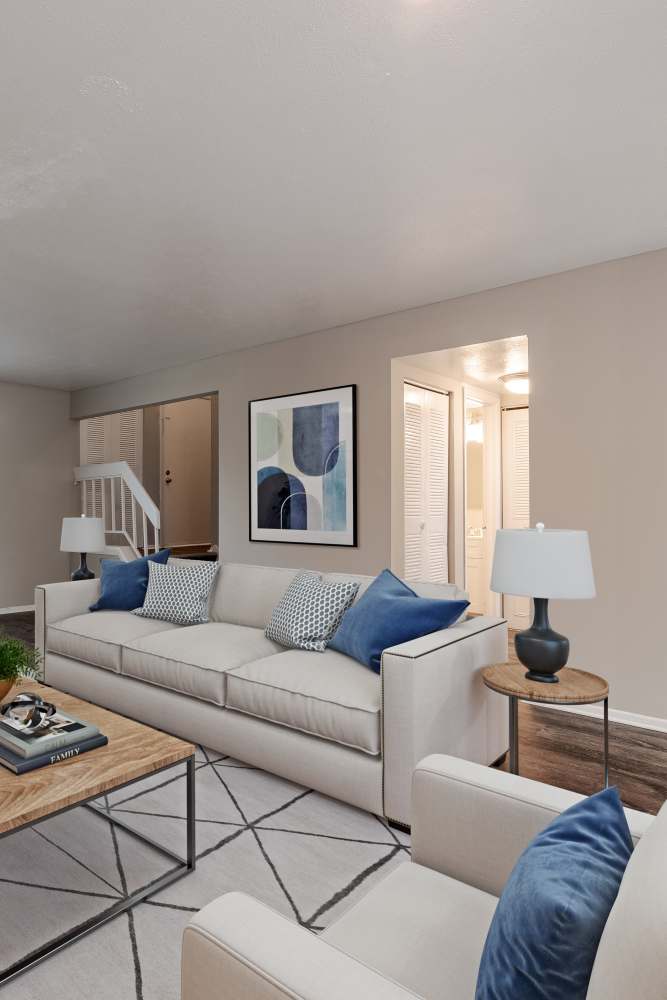 Staged living room with vinyl plank flooring