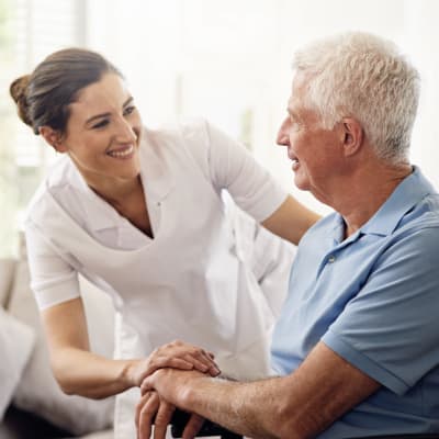 A nurse checking on a resident at The Sanctuary at St. Cloud in St Cloud, Minnesota