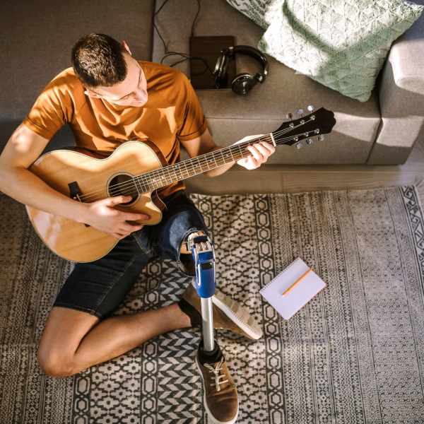 A resident plays his guitar at CovePointe at The Landings, Norfolk, Virginia