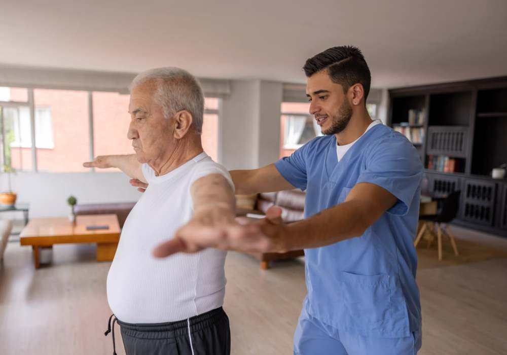 Resident doing physical therapy with caretaker at Clearwater at South Bay in Torrance, California