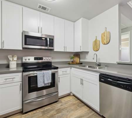 Dining room with a washer and dryer at Paloma Summit Condominium Rentals in Foothill Ranch, California