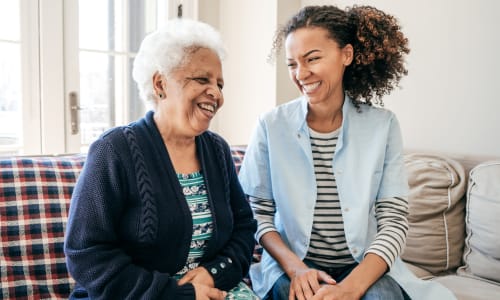 Resident with caregiver at The Blake at Charlottesville in Charlottesville, Virginia