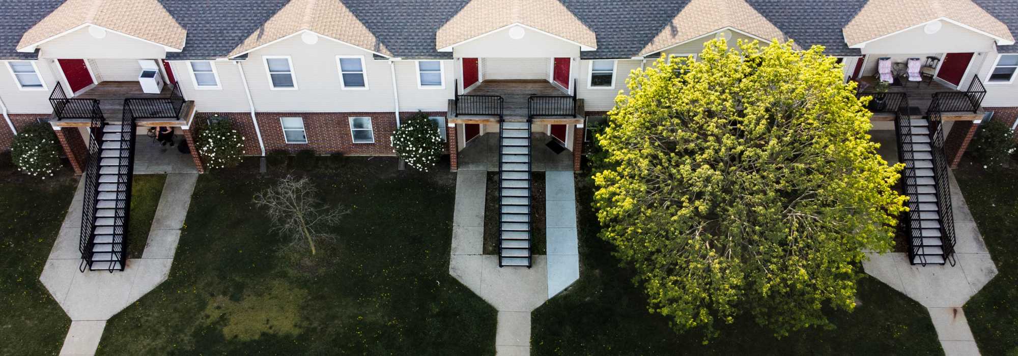 Great view of apartments and green lawn at Cameron Creek Apartments in Galloway, Ohio