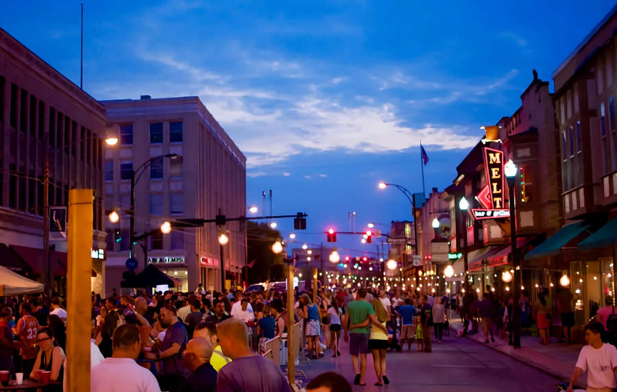 Evening street event with vibrant community gathering at 12000 Edgewater in Lakewood, Ohio