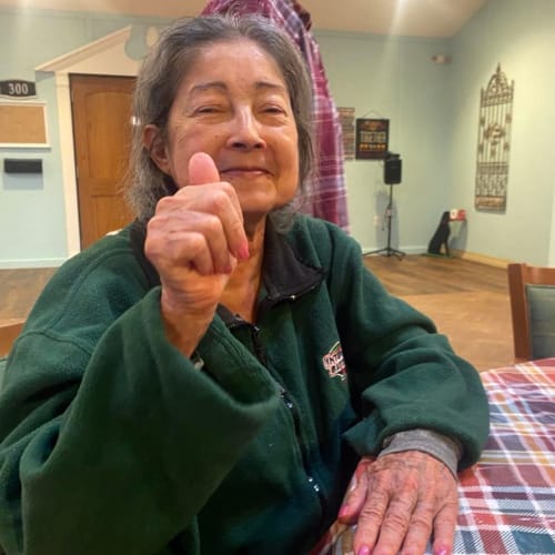 Resident playing with a ball at Oxford Glen Memory Care at Sachse in Sachse, Texas