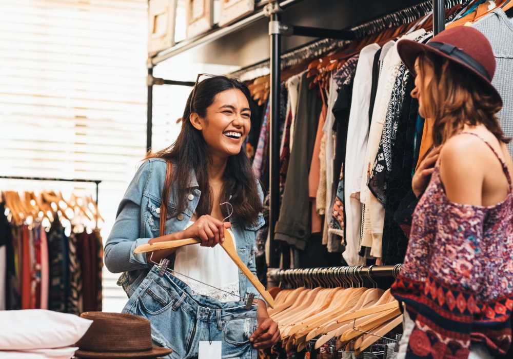 Friends shopping together at a local boutique near North Road Townhomes in Scottsville, New York