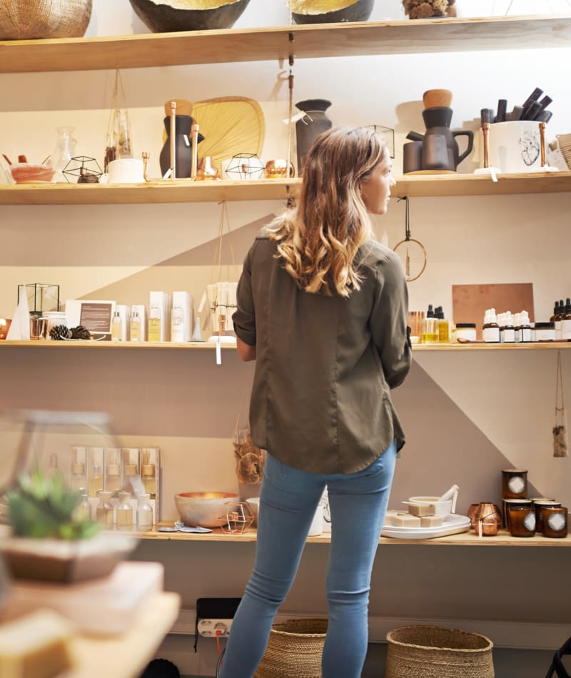 Resident shopping at a local boutique near Mercury NoDa in Charlotte, North Carolina