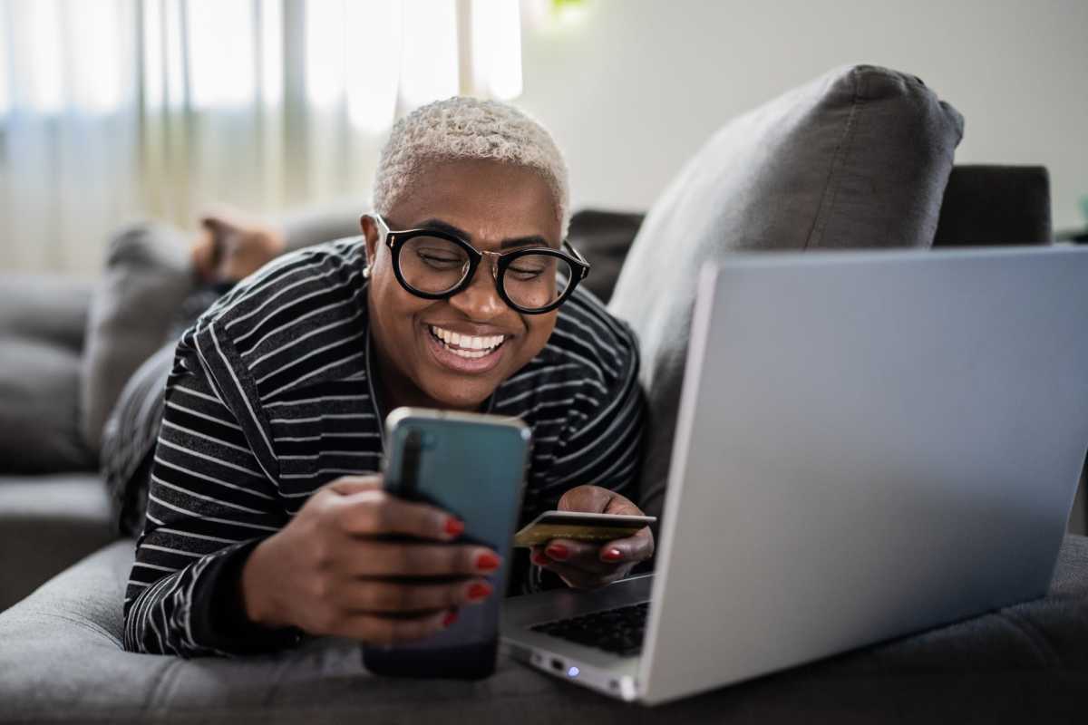 Resident working on her laptop at Adobe Ranch in Borger, Texas